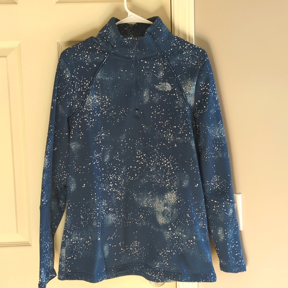 The North Face Blue and White speckled pattern